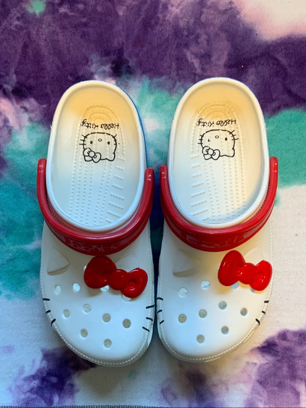 CROCS White women’s Clogs with Red Bow Accents